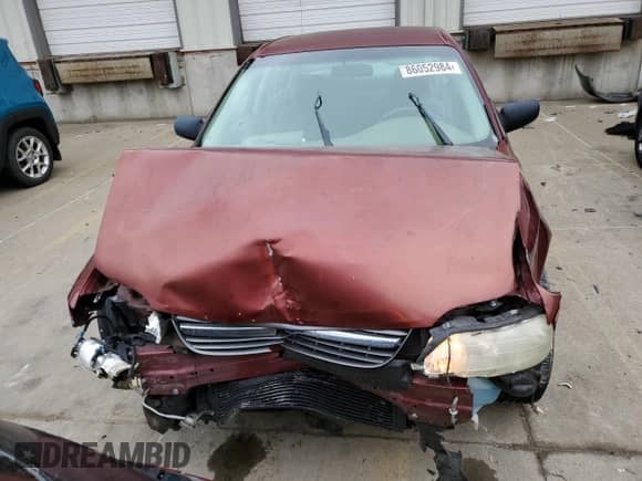 2003 Chevrolet Malibu with VIN 1G1ND52J13M696712, listed as a Copart auction lot 86052984 with 81,635 mi miles and Salvage title. Bid and sale history available at DreamBid. Image 5.