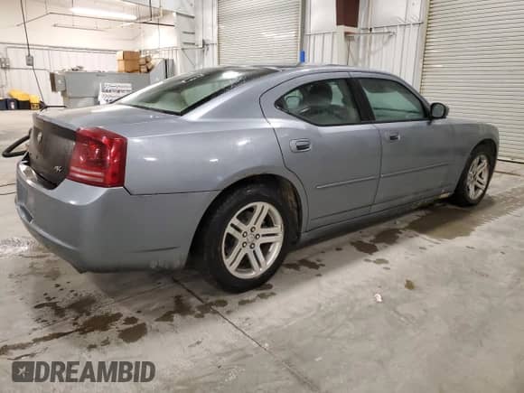 2006 Dodge Charger R/T with VIN 2B3KA53H76H148284, listed as a Copart auction lot 82766825 with 241,172 mi miles and Salvage title. Bid and sale history available at DreamBid. Image 3.
