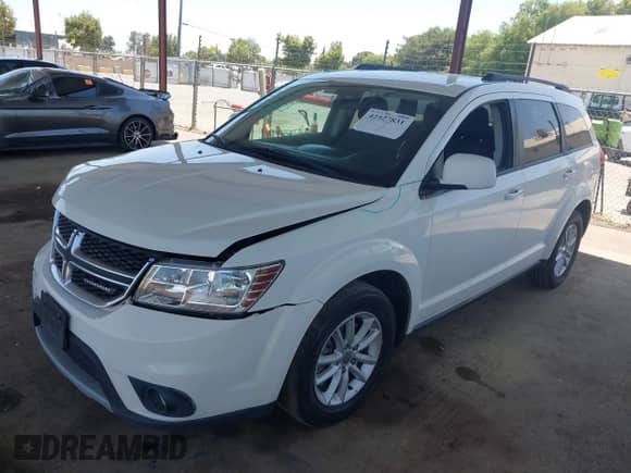 2015 Dodge Journey SXT z VIN 3C4PDCBB5FT568999, wystawiony jako IAAI lot #42527831 z przebiegiem 163 836 mil mil oraz . Historia ofert i sprzedaży dostępna na DreamBid. Obrazek 17.