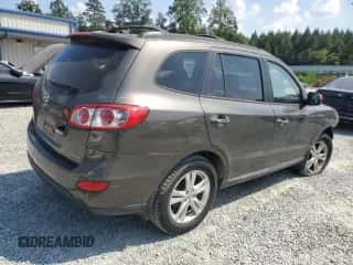 2012 Hyundai Santa Fe Limited с VIN 5XYZK4AG5CG154058, выставлен на аукционе Copart как лот 67898394 с пробегом 94 880 миль миль и Списание • Salvage title. История ставок и продаж доступна на DreamBid. Изображение 3.