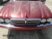 ✅ 2000 Jaguar XJ Vanden Plas • VIN: SAJDA24C2YLF11383 • Лот: 65968655. Опубликован ранее на Copart с пробегом 156 743 миль. Бесплатный доступ к архиву аукционных продаж из США и подробный отчёт об истории автомобиля на DreamBid. Изображение 11.