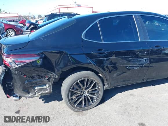 2023 Toyota Camry SE with VIN 4T1G11AK3PU732557, listed as a IAAI auction lot 43306245 with 29,469 mi miles and . Bid and sale history available at DreamBid. Image 6.