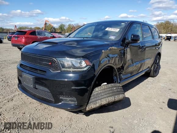 2020 Dodge Durango R/T with VIN 1C4SDJCT3LC125053, listed as a Copart auction lot 86787445 with 64,913 mi miles and Salvage title. Bid and sale history available at DreamBid. Image 1.