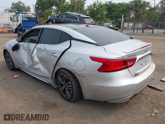 ✅ 2017 Nissan Maxima SV • VIN: 1N4AA6APXHC394736 • Лот: 42914564. Опубликован ранее на IAAI с пробегом 98 249 миль. Бесплатный доступ к архиву аукционных продаж из США и подробный отчёт об истории автомобиля на DreamBid. Изображение 3.