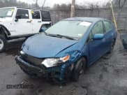 ✅ 2012 Honda Insight • VIN: JHMZE2H31CS005377 • Lot: 41879122. Listed on IAAI with 136,646 mi. Free auction sales archive from the USA and detailed vehicle history report at DreamBid. Image 2.