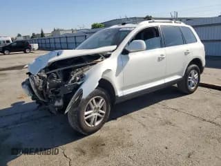 ✅ 2010 Volkswagen Touareg VR6 • VIN: WVGBF7A93AD002943 • Lot: 69794765. Wystawiony na Copart z przebiegiem 225 520 mil. Bezpłatny archiwum sprzedaży aukcyjnych z USA i szczegółowy raport historii pojazdu na DreamBid. Zdjęcie 1.