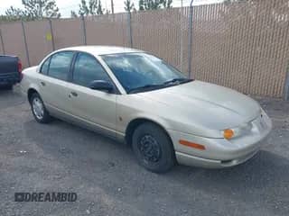 2000 Saturn SL z VIN 1G8ZH5286YZ219563, wystawiony jako IAAI lot #43197718 z przebiegiem 255 246 mil mil oraz . Historia ofert i sprzedaży dostępna na DreamBid. Obrazek 1.