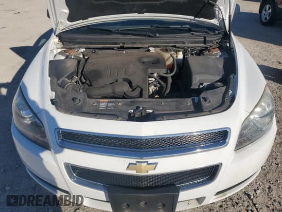 ✅ 2012 Chevrolet Malibu 1LS • VIN: 1G1ZB5E09CF222344 • Lot: 76659564. Listed on Copart with 84,735 mi. Free auction sales archive from the USA and detailed vehicle history report at DreamBid. Image 11.