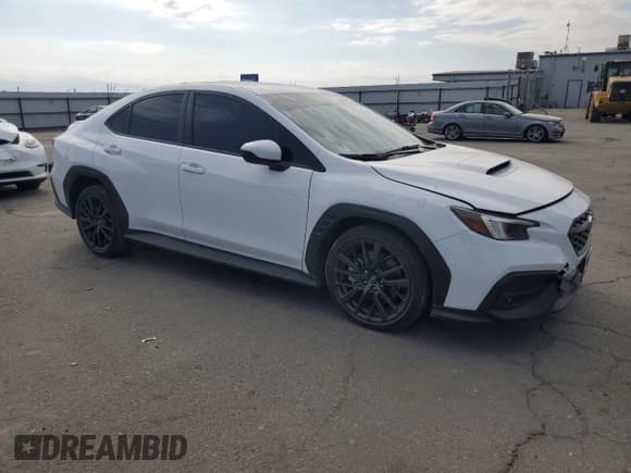 ✅ 2023 Subaru WRX Premium • VIN: JF1VBAF69P9824768 • Лот: 83853535. Опубликован ранее на Copart с пробегом 27 947 миль. Бесплатный доступ к архиву аукционных продаж из США и подробный отчёт об истории автомобиля на DreamBid. Изображение 4.