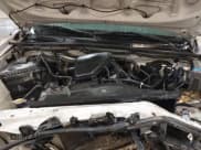 ✅ 2015 Toyota Tacoma • VIN: 5TFUX4EN9FX036973 • Lot: 41600331. Listed on IAAI with 150,343 mi. Free auction sales archive from the USA and detailed vehicle history report at DreamBid. Image 10.