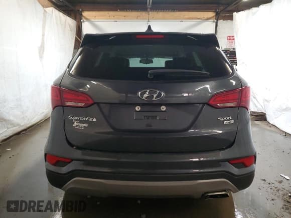 ✅ 2018 Hyundai Santa Fe 2.4L • VIN: 5XYZUDLB9JG524002 • Лот: 50347284. Опубликован ранее на Copart с пробегом 43 140 миль. Бесплатный доступ к архиву аукционных продаж из США и подробный отчёт об истории автомобиля на DreamBid. Изображение 6.