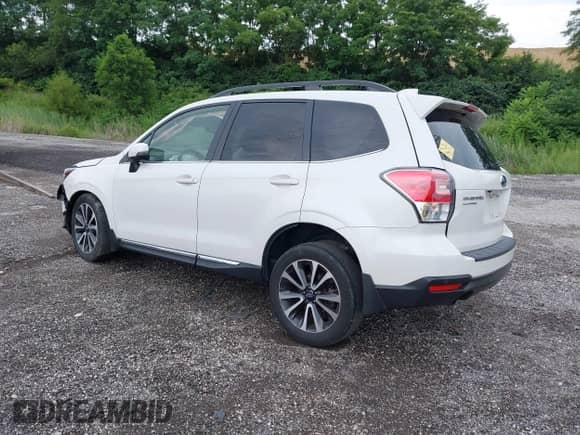2018 Subaru Forester Touring z VIN JF2SJGWC3JH607000, wystawiony jako IAAI lot #42664722 z przebiegiem 30 857 mil mil oraz . Historia ofert i sprzedaży dostępna na DreamBid. Obrazek 3.