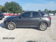 ✅ 2014 Mazda CX-5 Grand Touring • VIN: JM3KE2DY7E0300395 • Лот: 43293604. Опубликован ранее на IAAI с пробегом 161 782 миль. Бесплатный доступ к архиву аукционных продаж из США и подробный отчёт об истории автомобиля на DreamBid. Изображение 14.