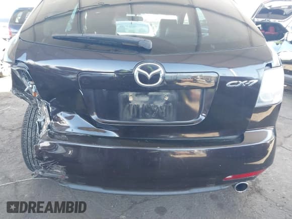 ✅ 2012 Mazda CX-7 i Touring • VIN: JM3ER2CMXC0421774 • Lot: 41743231. Wystawiony na IAAI z przebiegiem 132 488 mil. Bezpłatny archiwum sprzedaży aukcyjnych z USA i szczegółowy raport historii pojazdu na DreamBid. Zdjęcie 6.