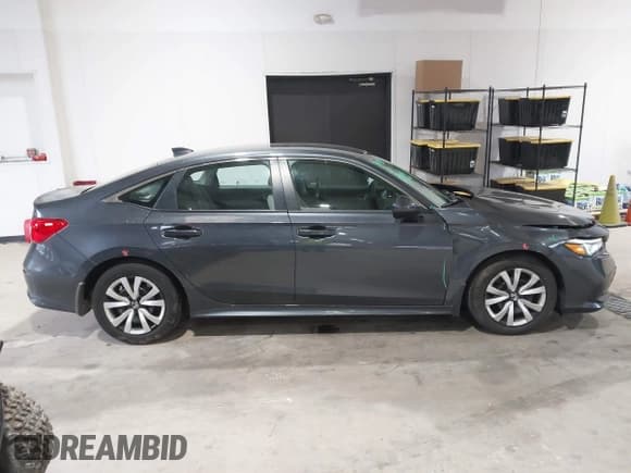 ✅ 2023 Honda Civic LX • VIN: 2HGFE2F26PH569829 • Lot: 43550592. Wystawiony na IAAI z przebiegiem 20 267 mil. Bezpłatny archiwum sprzedaży aukcyjnych z USA i szczegółowy raport historii pojazdu na DreamBid. Zdjęcie 13.