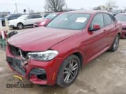 ✅ 2021 BMW X4 xDrive30i • VIN: 5UX2V1C02M9E92416 • Lot: 41960957. Listed on IAAI with 51,247 mi. Free auction sales archive from the USA and detailed vehicle history report at DreamBid. Image 2.