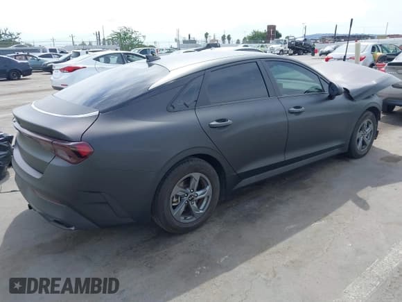 ✅ 2021 Kia K5 LX • VIN: 5XXG24J27MG028107 • Lot: 43247619. Wystawiony na IAAI z przebiegiem 70 981 mil. Bezpłatny archiwum sprzedaży aukcyjnych z USA i szczegółowy raport historii pojazdu na DreamBid. Zdjęcie 4.