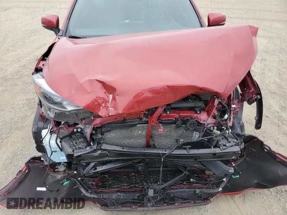 ✅ 2023 Toyota Corolla Cross Hybrid S • VIN: 7MUFBABG5PV013750 • Lot: 54069855. Listed on Copart with 33,564 mi. Free auction sales archive from the USA and detailed vehicle history report at DreamBid. Image 12.