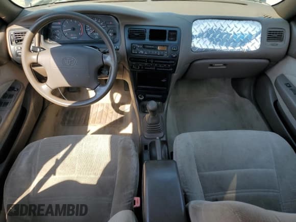 ✅ 1996 Toyota Corolla DX • VIN: 1NXBB02E8TZ387353 • Lot: 69556895. Listed on Copart with 187,677 mi. Free auction sales archive from the USA and detailed vehicle history report at DreamBid. Image 8.