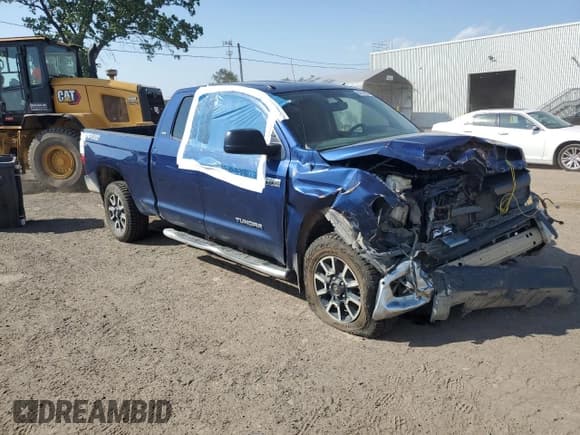 ✅ 2015 Toyota Tundra SR • VIN: 5TFUY5F1XFX431209 • Lot: 64778685. Listed on Copart with 282,356 mi. Free auction sales archive from the USA and detailed vehicle history report at DreamBid. Image 4.