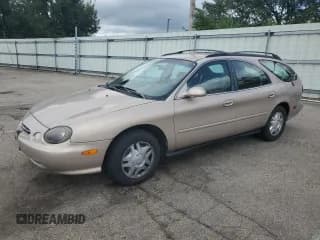 ✅ 1999 Ford Taurus SE Standard • VIN: 1FAFP58U0XG147341 • Лот: 65554485. Опубликован ранее на Copart с пробегом 89 805 миль. Бесплатный доступ к архиву аукционных продаж из США и подробный отчёт об истории автомобиля на DreamBid. Изображение 1.