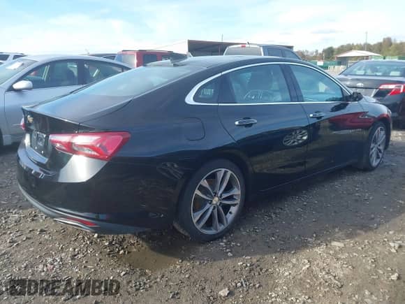 2020 Chevrolet Malibu Premier with VIN 1G1ZE5SX1LF042994, listed as a IAAI auction lot 40742491 with 131,999 mi miles and . Bid and sale history available at DreamBid. Image 4.