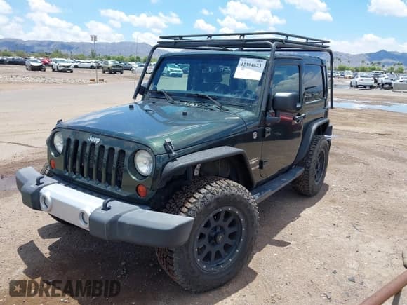 ✅ 2012 Jeep Wrangler Sahara • VIN: 1C4AJWBGXCL100527 • Lot: 42394623. Wystawiony na IAAI z przebiegiem 126 097 mil. Bezpłatny archiwum sprzedaży aukcyjnych z USA i szczegółowy raport historii pojazdu na DreamBid. Zdjęcie 2.