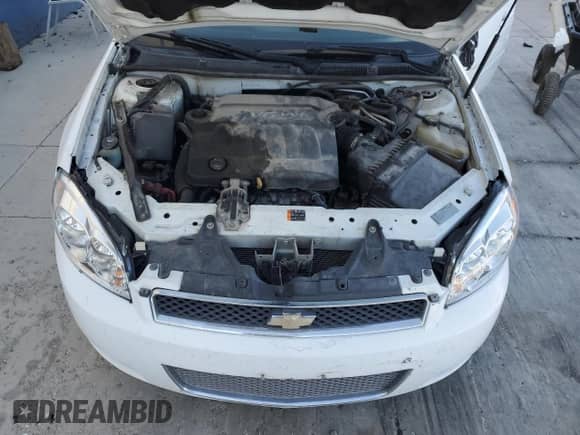 2013 Chevrolet Impala LS with VIN 2G1WF5E37D1184588, listed as a Copart auction lot 82370615 with 220,421 mi miles and Salvage title. Bid and sale history available at DreamBid. Image 11.