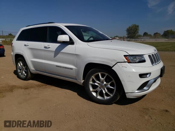 ✅ 2015 Jeep Grand Cherokee Summit • VIN: 1C4RJFJG1FC794744 • Lot: 81467795. Listed on Copart with 126,762 mi. Free auction sales archive from the USA and detailed vehicle history report at DreamBid. Image 4.
