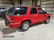 2002 Chevrolet Blazer LS z VIN 1GNDT13WX2K174090, wystawiony jako Copart lot #81279404 z przebiegiem 168 373 mil mil oraz Szkoda całkowita • Salvage title. Historia ofert i sprzedaży dostępna na DreamBid. Obrazek 3.
