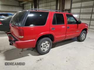 2002 Chevrolet Blazer LS z VIN 1GNDT13WX2K174090, wystawiony jako Copart lot #81279404 z przebiegiem 168 373 mil mil oraz Szkoda całkowita • Salvage title. Historia ofert i sprzedaży dostępna na DreamBid. Obrazek 3.