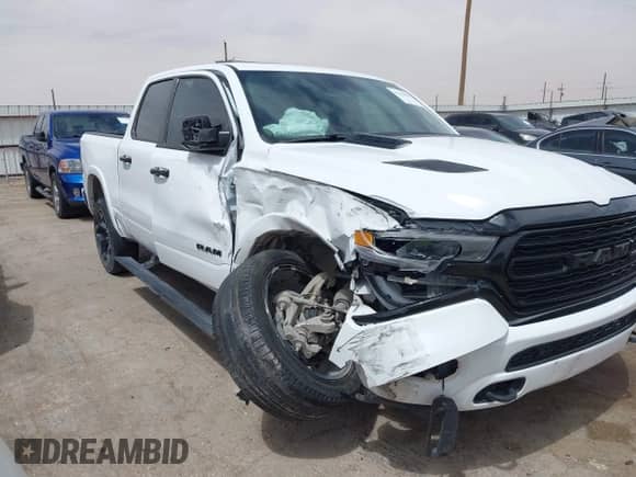 2023 Ram 1500 Limited with VIN 1C6SRFHT5PN576378, listed as a IAAI auction lot 42253096 with 41,802 mi miles and . Bid and sale history available at DreamBid. Image 1.