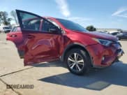 ✅ 2018 Toyota RAV4 XLE • VIN: 2T3WFREV4JW449406 • Lot: 86521765. Listed on Copart with 110,206 mi. Free auction sales archive from the USA and detailed vehicle history report at DreamBid. Image 4.