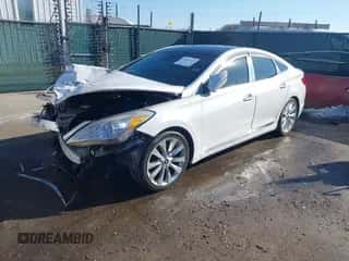 2016 Hyundai Azera Limited z VIN KMHFH4JG7GA536630, wystawiony jako IAAI lot #41444129 z przebiegiem 128 309 mil mil oraz . Historia ofert i sprzedaży dostępna na DreamBid. Obrazek 2.