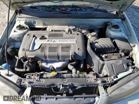 2004 Hyundai Elantra GLS z VIN KMHDN46D94U709721, wystawiony jako Copart lot #75496294 z przebiegiem Nie podano mil oraz Nie do naprawy • Non repairable. Historia ofert i sprzedaży dostępna na DreamBid. Obrazek 11.