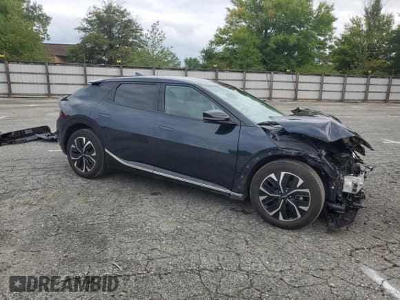 ✅ 2023 Kia EV6 Wind • VIN: KNDC34LA6P5610126 • Lot: 71825534. Wystawiony na Copart z przebiegiem 55 662 mil. Bezpłatny archiwum sprzedaży aukcyjnych z USA i szczegółowy raport historii pojazdu na DreamBid. Zdjęcie 4.