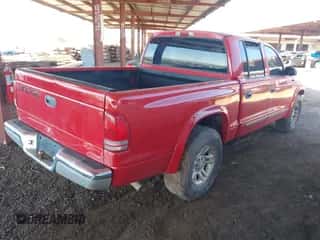 2002 Dodge Dakota SLT z VIN 1B7HL48X72S542335, wystawiony jako IAAI lot #43320738 z przebiegiem 239 957 mil mil oraz . Historia ofert i sprzedaży dostępna na DreamBid. Obrazek 4.