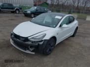 ✅ 2019 Tesla Model 3 Mid Range • VIN: 5YJ3E1EA5KF509334 • Лот: 41916361. Опубликован ранее на IAAI с пробегом 108 083 миль. Бесплатный доступ к архиву аукционных продаж из США и подробный отчёт об истории автомобиля на DreamBid. Изображение 2.