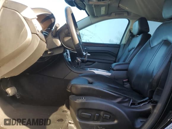 ✅ 2014 Cadillac SRX Performance Collection • VIN: 3GYFNCE31ES663524 • Лот: 82245055. Опубликован ранее на Copart с пробегом Не указан. Бесплатный доступ к архиву аукционных продаж из США и подробный отчёт об истории автомобиля на DreamBid. Изображение 7.