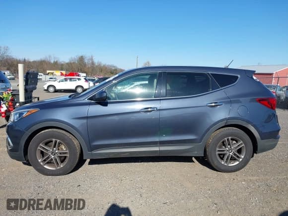 ✅ 2018 Hyundai Santa Fe 2.4L • VIN: 5NMZT3LB6JH086106 • Лот: 43691737. Опубликован ранее на IAAI с пробегом 113 510 миль. Бесплатный доступ к архиву аукционных продаж из США и подробный отчёт об истории автомобиля на DreamBid. Изображение 14.