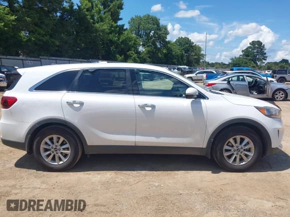 ✅ 2019 Kia Sorento S • VIN: 5XYPG4A57KG497296 • Лот: 42595113. Опубликован ранее на IAAI с пробегом 59 034 миль. Бесплатный доступ к архиву аукционных продаж из США и подробный отчёт об истории автомобиля на DreamBid. Изображение 13.