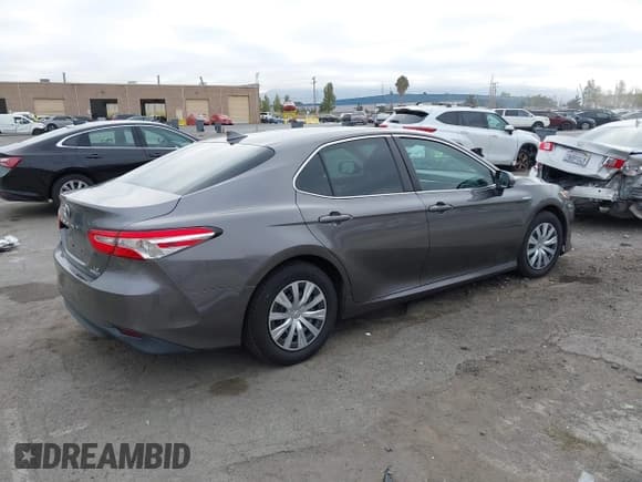 ✅ 2020 Toyota Camry Hybrid LE • VIN: 4T1C31AK4LU518924 • Lot: 43100533. Listed on IAAI with 137,023 mi. Free auction sales archive from the USA and detailed vehicle history report at DreamBid. Image 4.