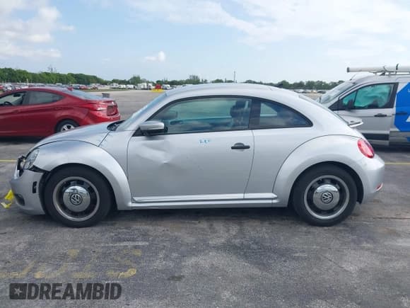 ✅ 2015 Volkswagen Beetle Fleet Edition • VIN: 3VWF17AT1FM649625 • Lot: 42352049. Listed on IAAI with Not provided. Free auction sales archive from the USA and detailed vehicle history report at DreamBid. Image 14.