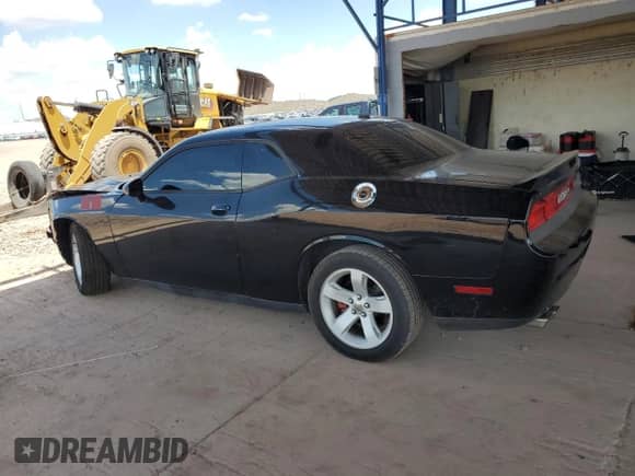 2014 Dodge Challenger Shaker with VIN 2C3CDYBT0EH299553, listed as a Copart auction lot 65808675 with 100,896 mi miles and Salvage title. Bid and sale history available at DreamBid. Image 2.