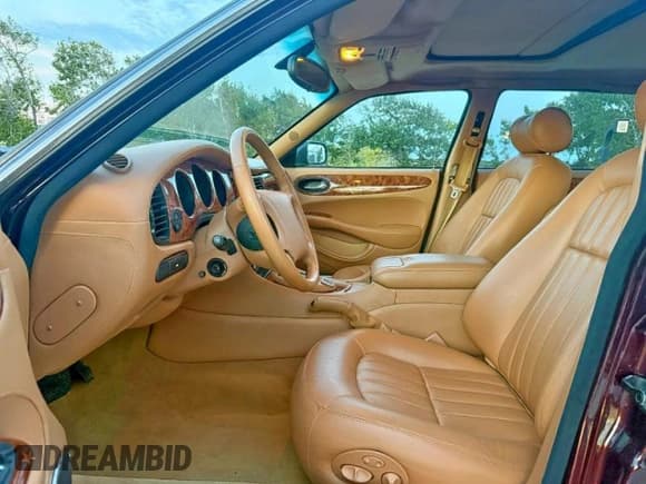 ✅ 2000 Jaguar XJ • VIN: SAJDA23C9YLF18784 • Лот: 91946295. Опубликован ранее на Copart с пробегом 81 605 миль. Бесплатный доступ к архиву аукционных продаж из США и подробный отчёт об истории автомобиля на DreamBid. Изображение 14.