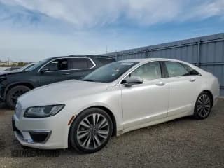 ✅ 2017 Lincoln MKZ Reserve • VIN: 3LN6L5E96HR665112 • Lot: 91493475. Wystawiony na Copart z przebiegiem 128 482 mil. Bezpłatny archiwum sprzedaży aukcyjnych z USA i szczegółowy raport historii pojazdu na DreamBid. Zdjęcie 1.