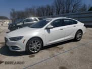 ✅ 2020 Buick Regal Avenir • VIN: W04GW6SX6L1009868 • Lot: 52039075. Listed on Copart with 70,756 mi. Free auction sales archive from the USA and detailed vehicle history report at DreamBid. Image 1.