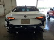 ✅ 2024 Alfa Romeo Giulia Veloce • VIN: ZARFAMBN7R7678617 • Лот: 63593855. Опубликован ранее на Copart с пробегом 21 474 миль. Бесплатный доступ к архиву аукционных продаж из США и подробный отчёт об истории автомобиля на DreamBid. Изображение 6.