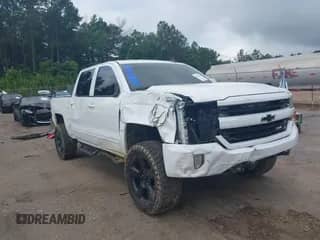 2016 Chevrolet Silverado 1500 LT z VIN 3GCUKREC2GG112839, wystawiony jako IAAI lot #42356516 z przebiegiem 116 937 mil mil oraz . Historia ofert i sprzedaży dostępna na DreamBid. Obrazek 1.