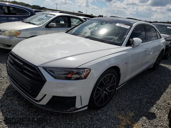 ✅ 2021 Audi A8 • VIN: WAU8DAF81MN011833 • Лот: 74031874. Опубликован ранее на Copart с пробегом 53 125 миль. Бесплатный доступ к архиву аукционных продаж из США и подробный отчёт об истории автомобиля на DreamBid. Изображение 1.